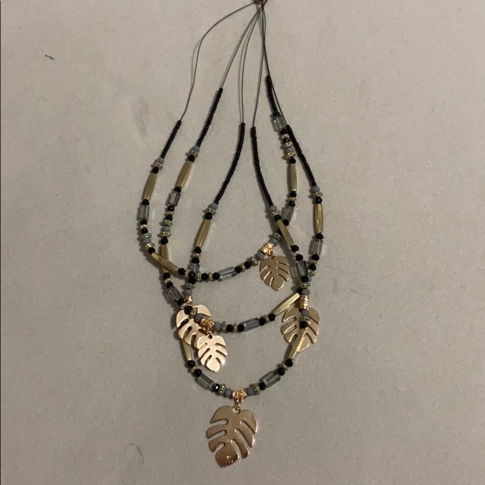New gold/black Monstera beaded necklace